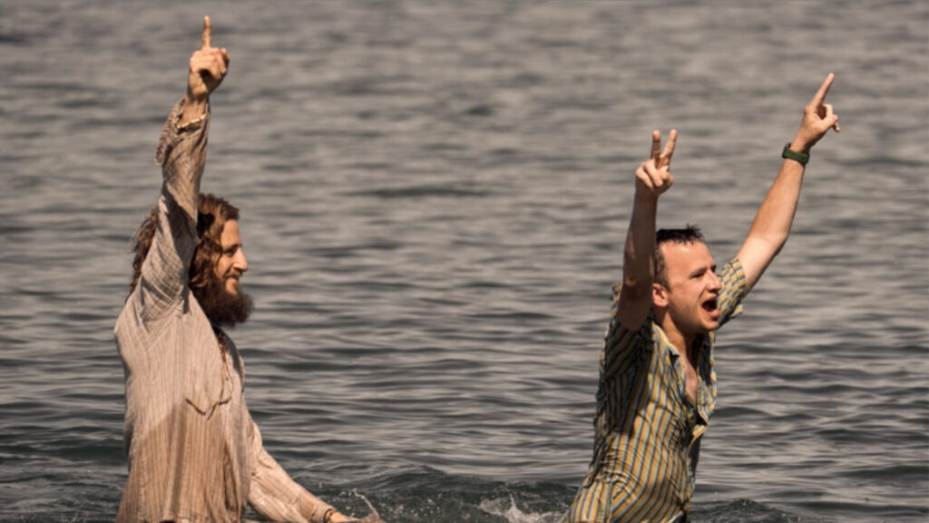 Jesus Revolution baptisms in pirates cove
